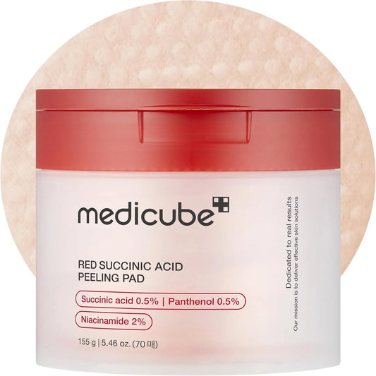 Medicube Red Succinic Acid Peeling Pad packaging on a beige background