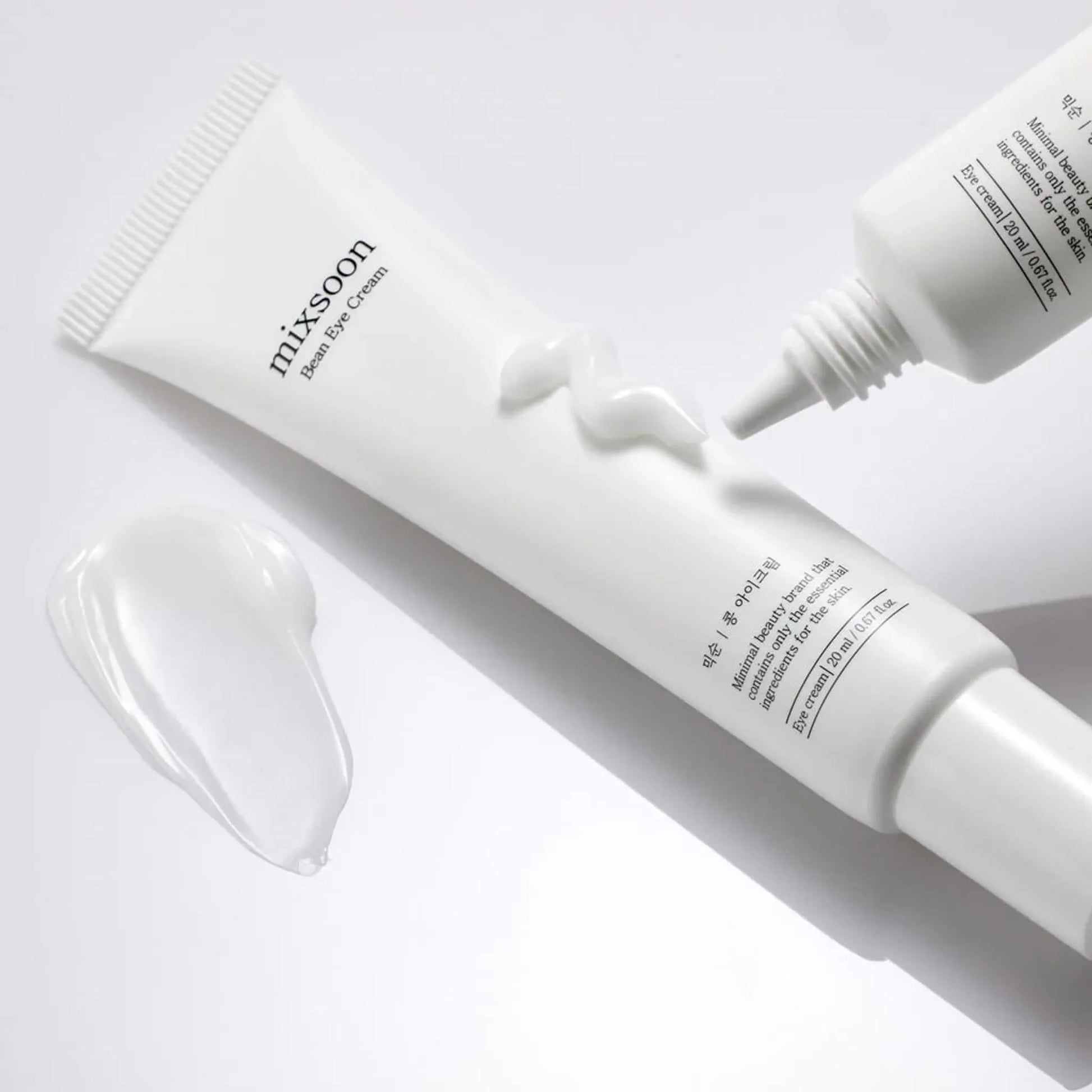 White skincare product with 'mixscot' branding on a light gray background